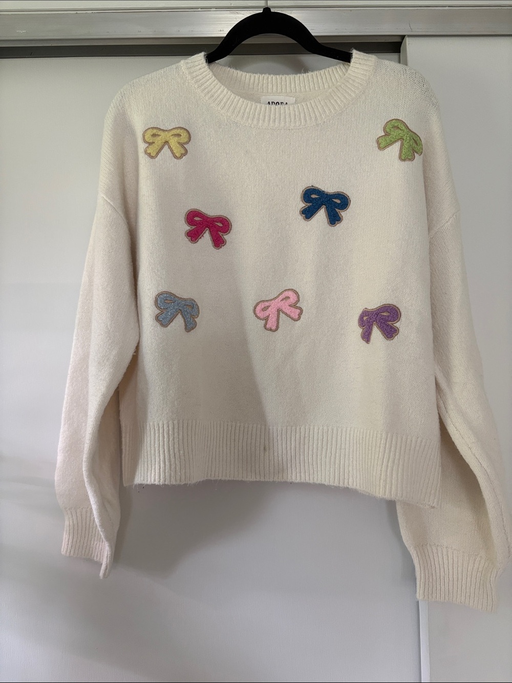 Adora size Medium Cream Crewneck Sweater with Multicolor Bow Appliqués